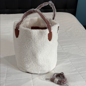 VENUS White and Brown Tote Bag. NWOT 31” diameter. 13.5” tall. Never used.